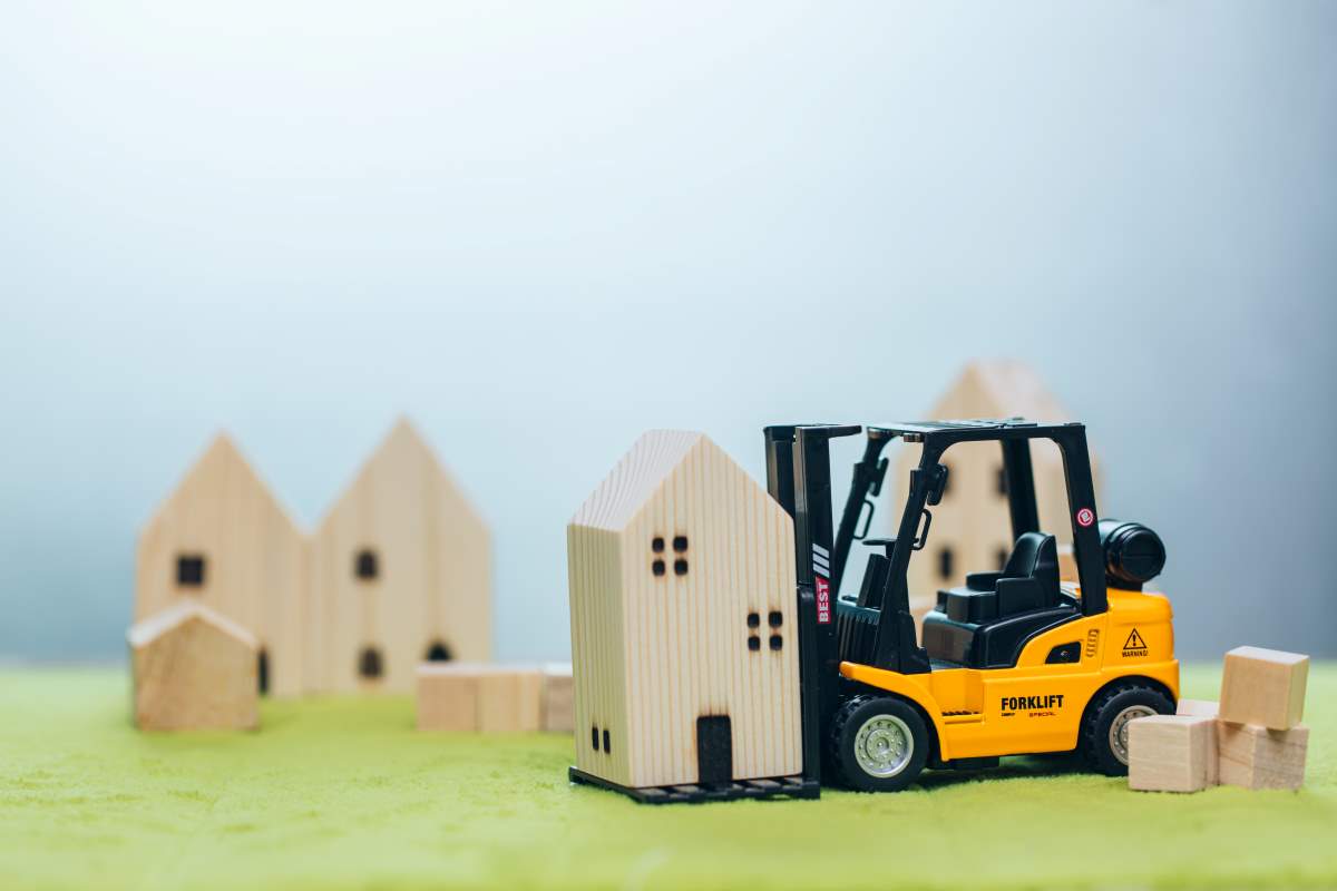 small home with forklift for moving